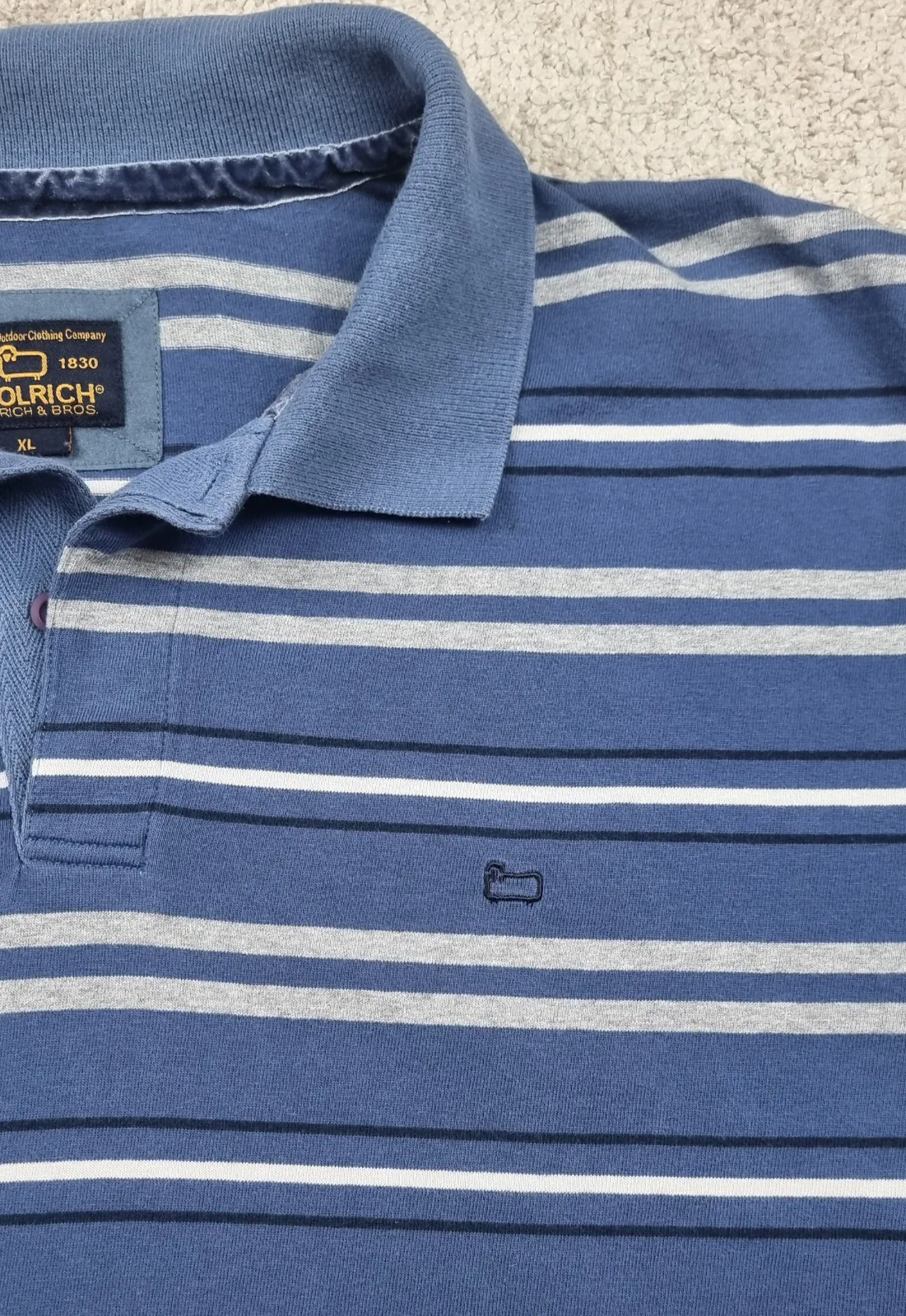Polo woolrich rayas azules blancas 5