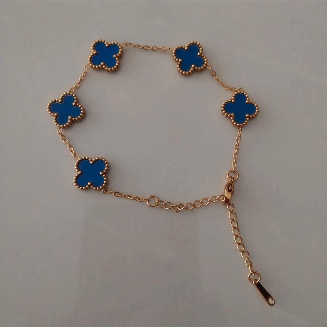 Bracelet trèfle bleu acier inoxydable neuf