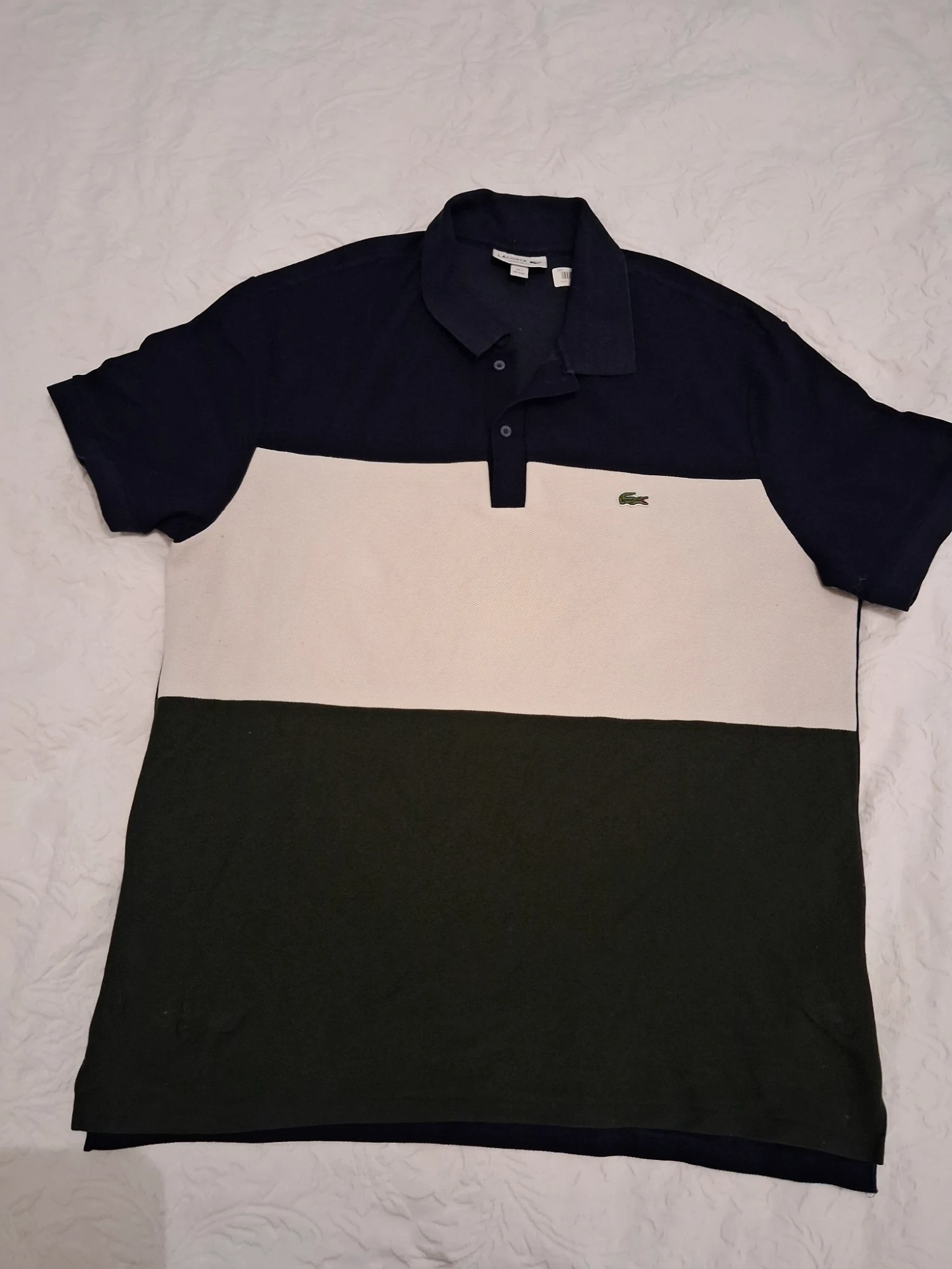 Polo Lacoste tricolore à manches courtes