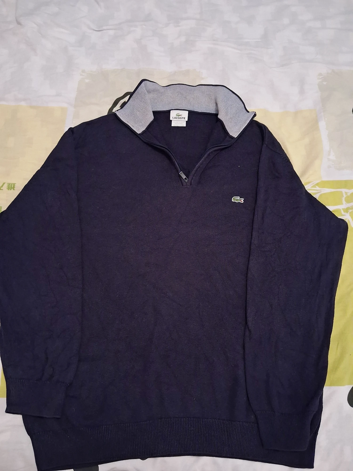 Pull col zippé Lacoste bleu marine taille 7