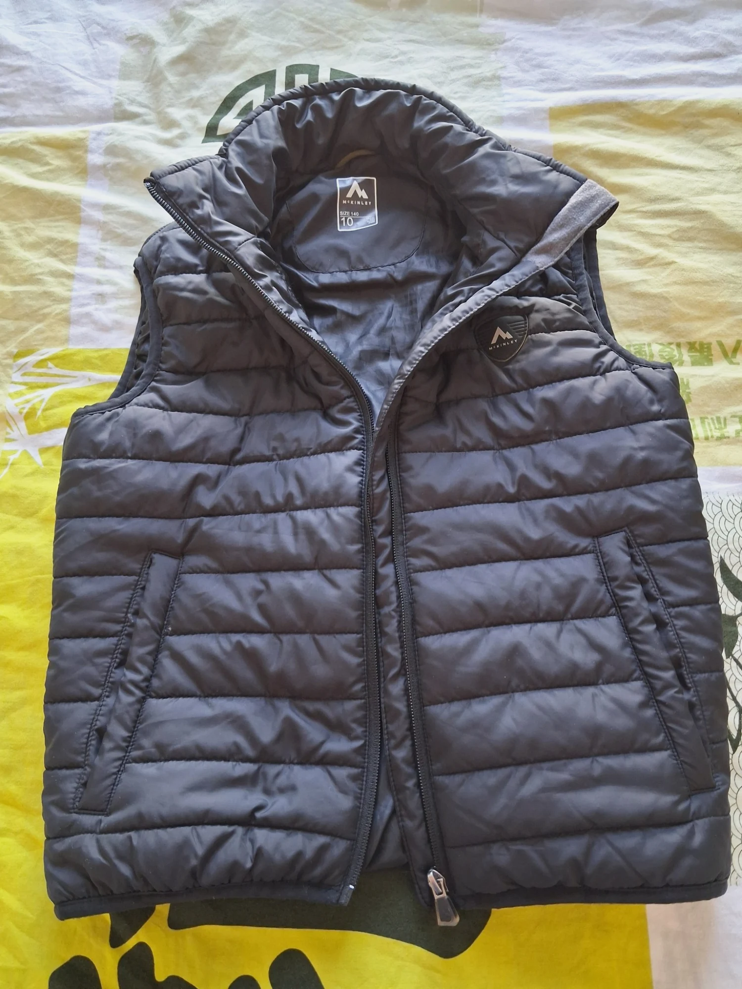 Doudoune sans manches McKinley noire 10 ans