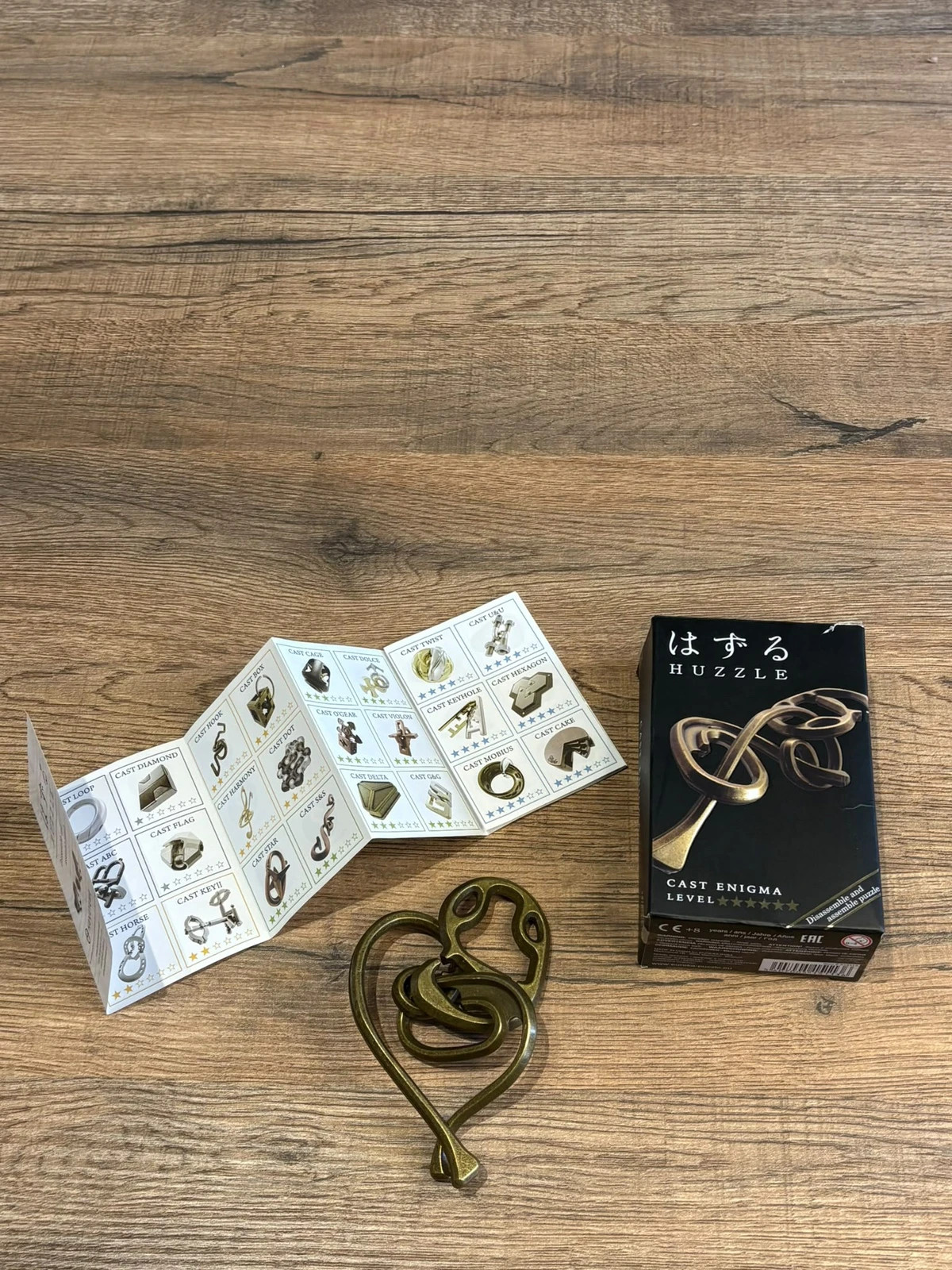 Casse Tete Hanayama Cast Enigma Huzzle Niveau 6 Expert Metal Dore Boite – hanayama 2