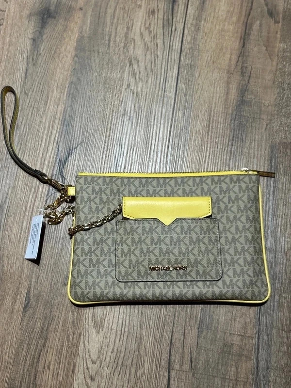 Sacoche michael Kors couleur jaune neuve / femme