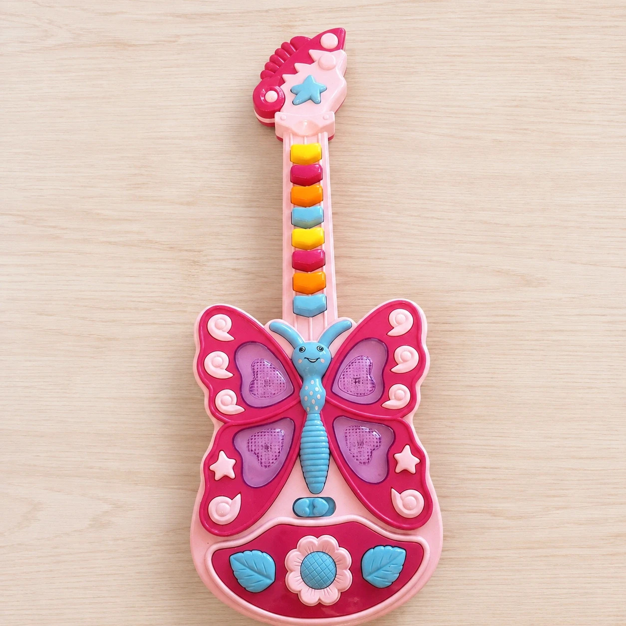 Guitarra de juguete musical mariposa