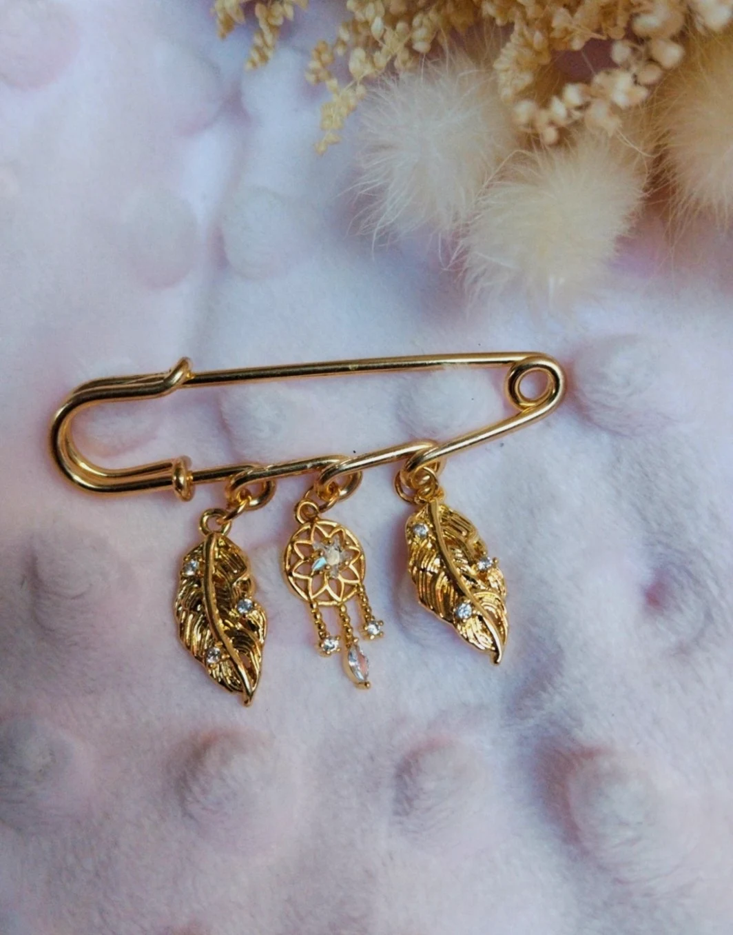 Broche épingle attrape rêve, dorée, strass