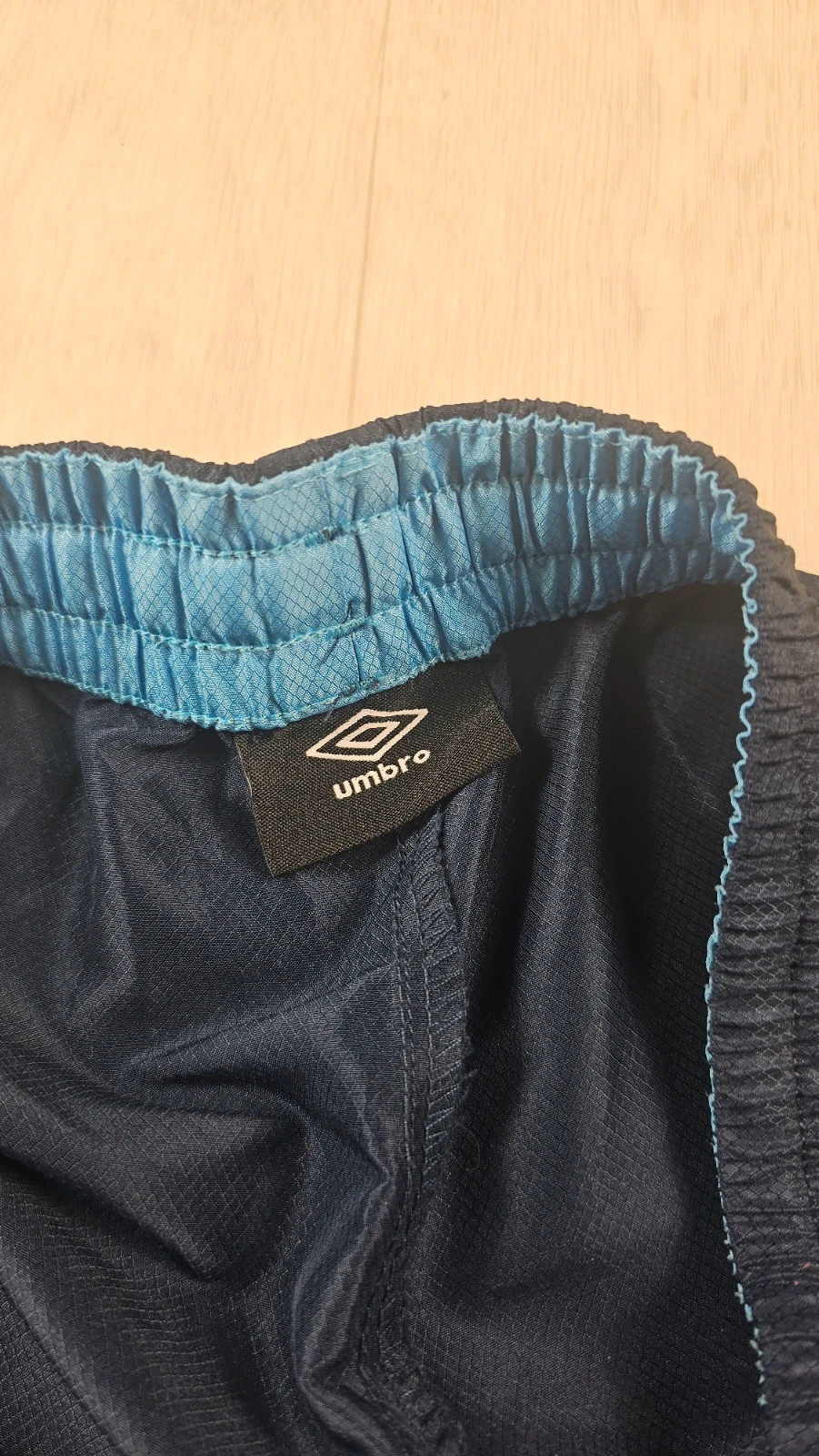 Short de sport Umbro bleu homme L défaut – Umbro – taille L 4