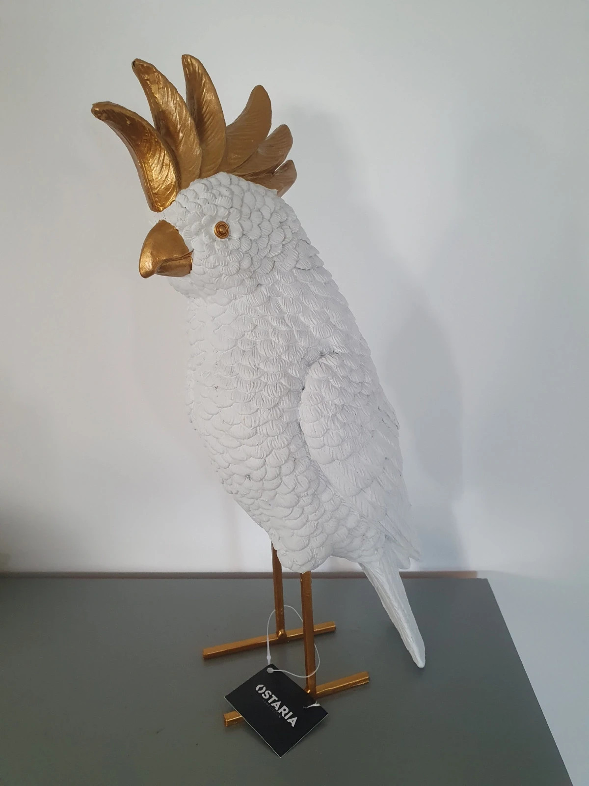 Joli oiseau décoratif blanc et doré