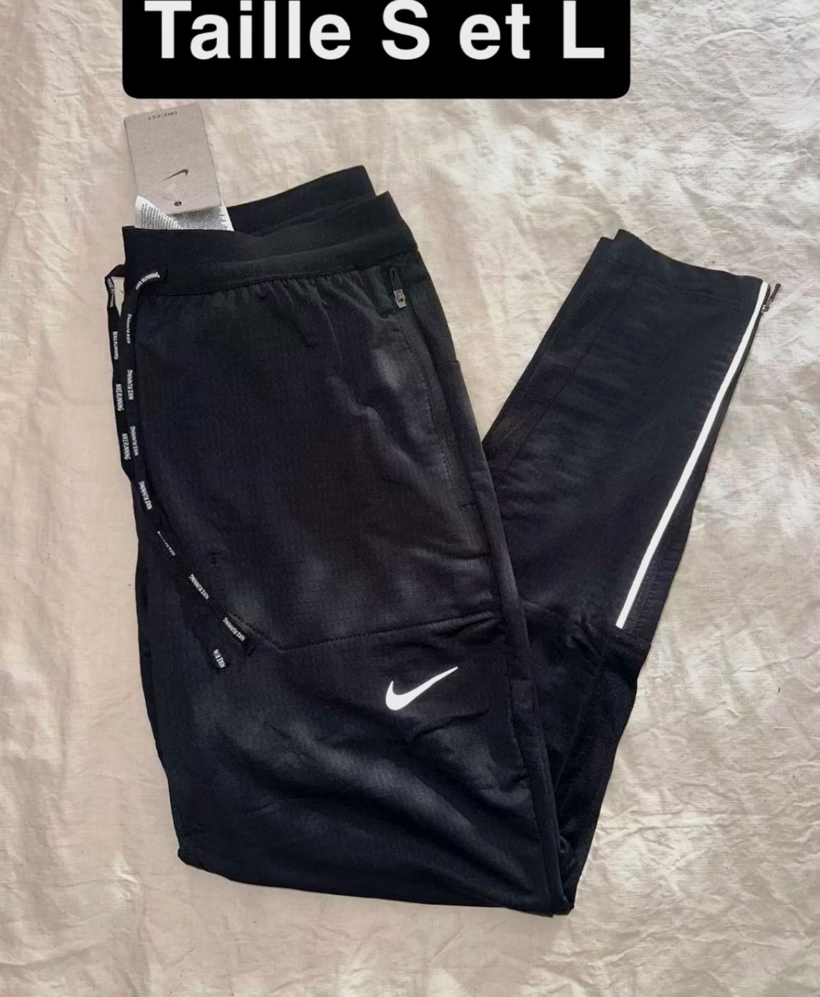 Pantalon de running noir Nike disponible en taille L – Nike – taille EU 42 5