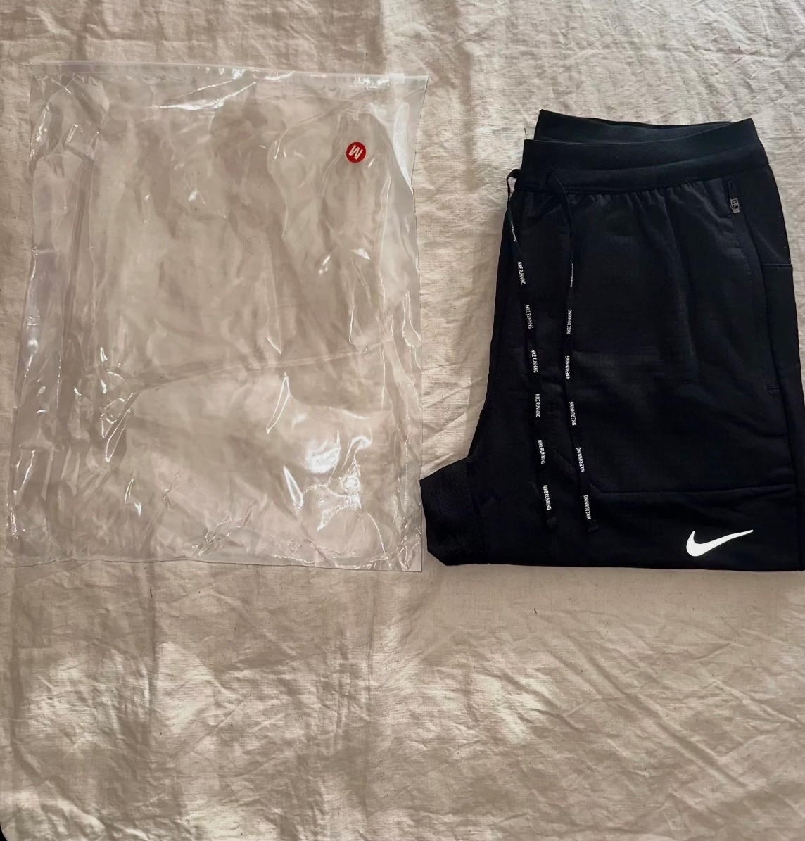 Pantalon de running noir Nike disponible en taille L – Nike – taille EU 42 4