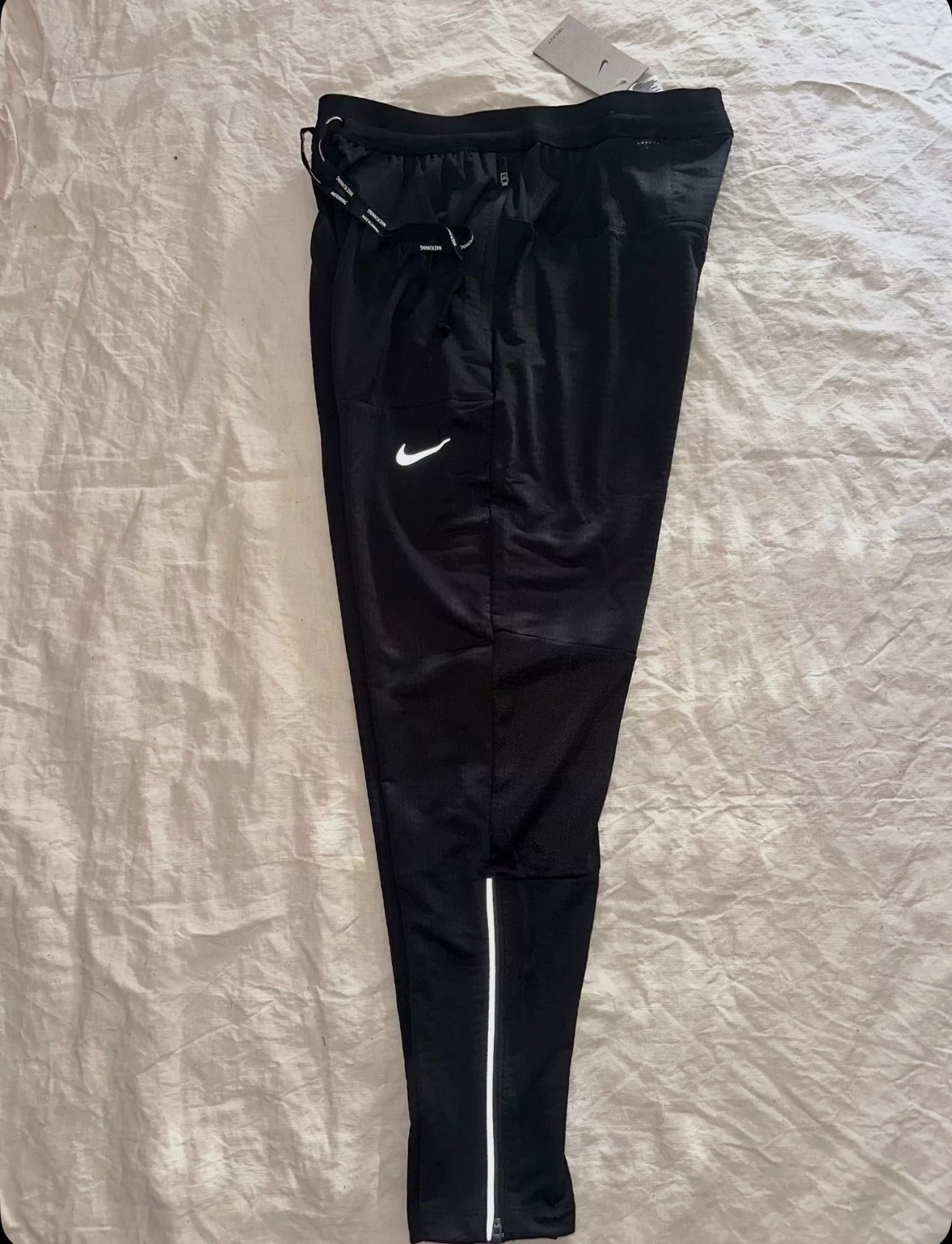 Pantalon de running noir Nike disponible en taille L – Nike – taille EU 42 2