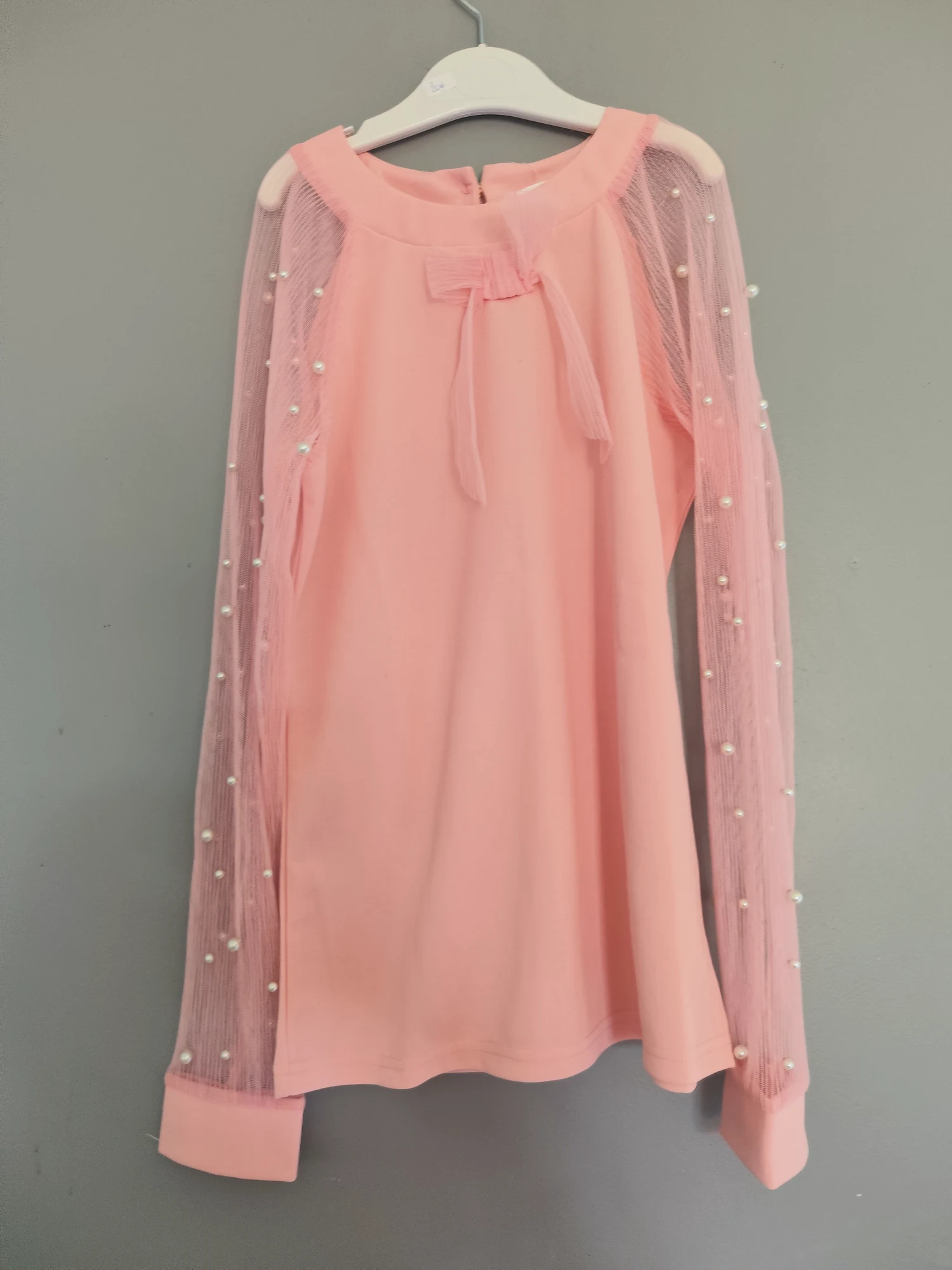Haut rose manches tulle et perles
