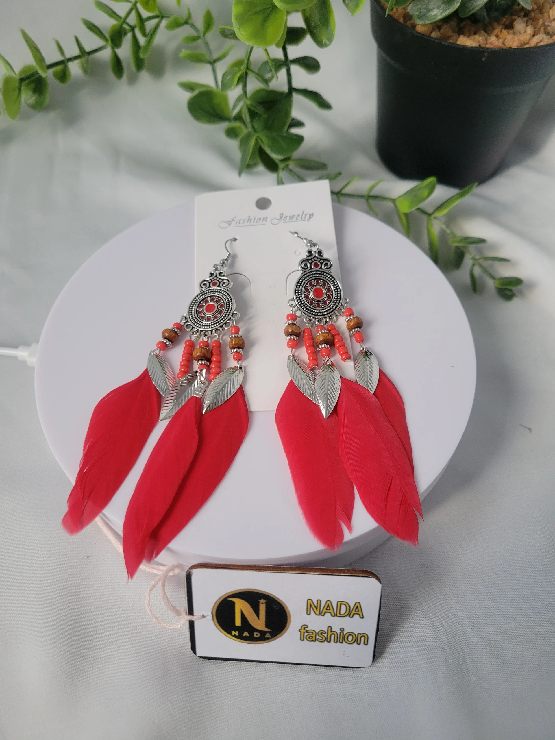 Boucles d'oreilles en plumes rouge 2