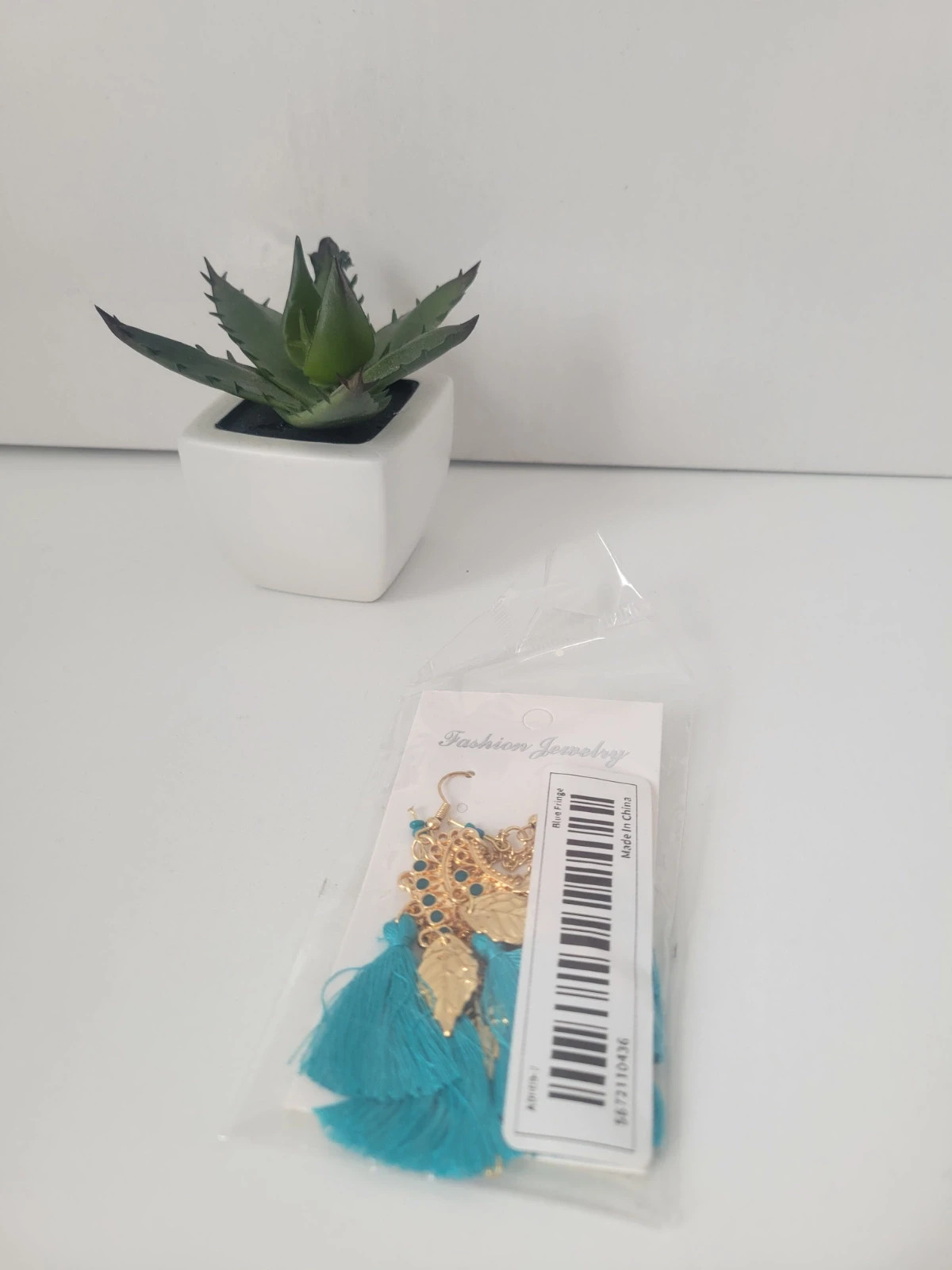 Boucle d'oreille doré bleu 2