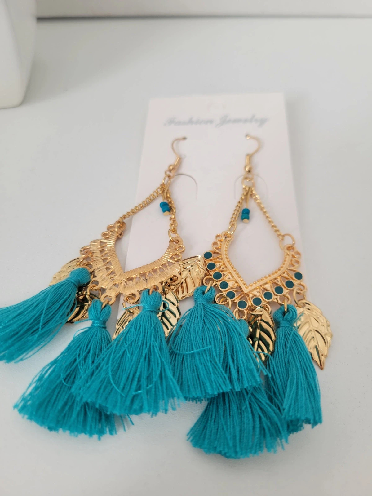 Boucle d'oreille doré bleu 3
