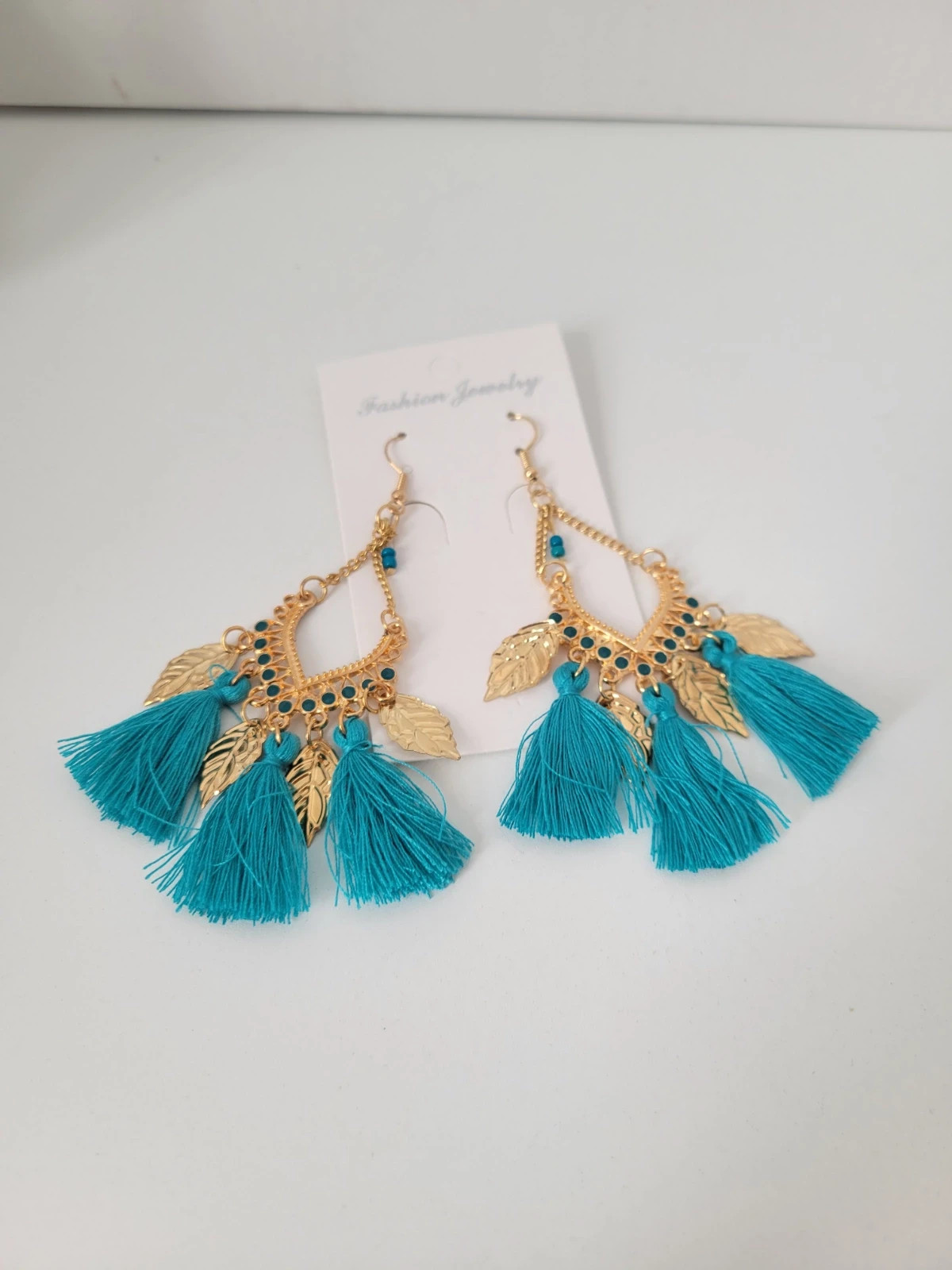 Boucle d'oreille doré bleu 5