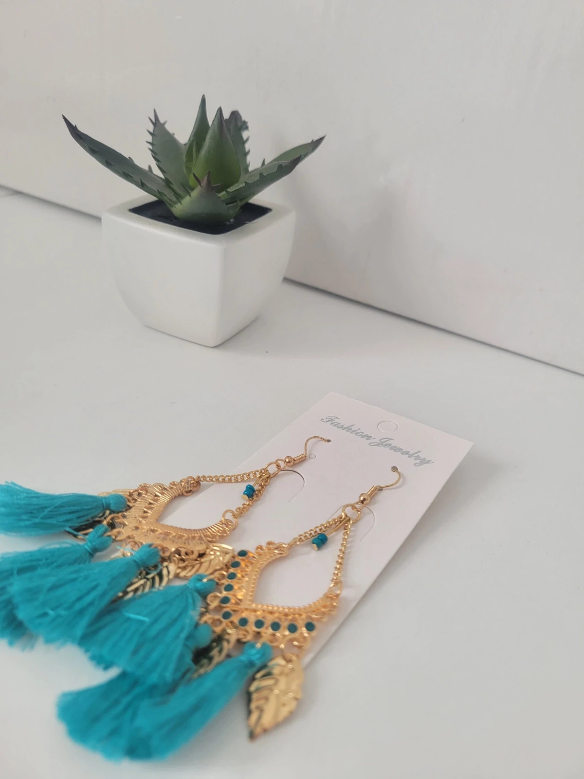Boucle d'oreille doré bleu 4