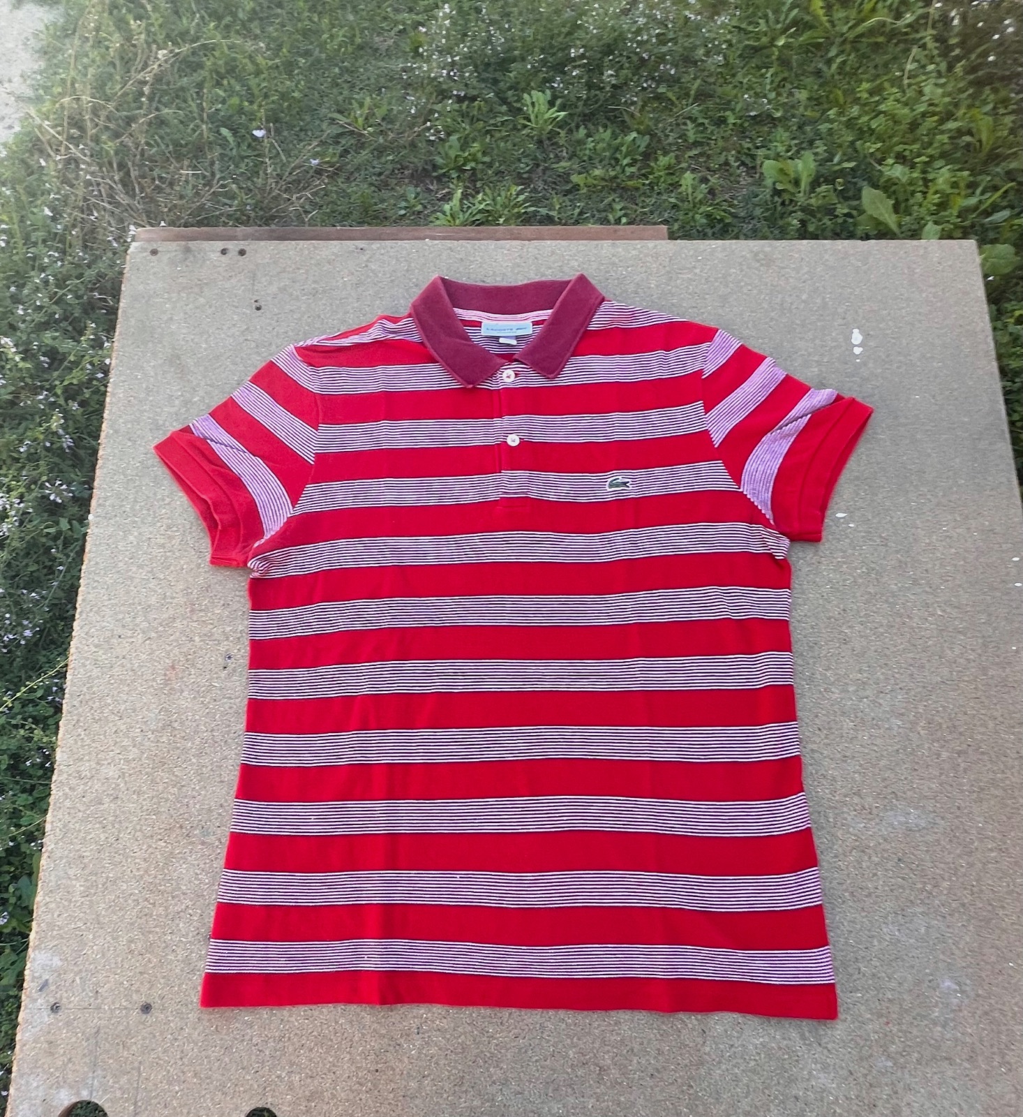 Polo rayé Lacoste rouge et bordeaux