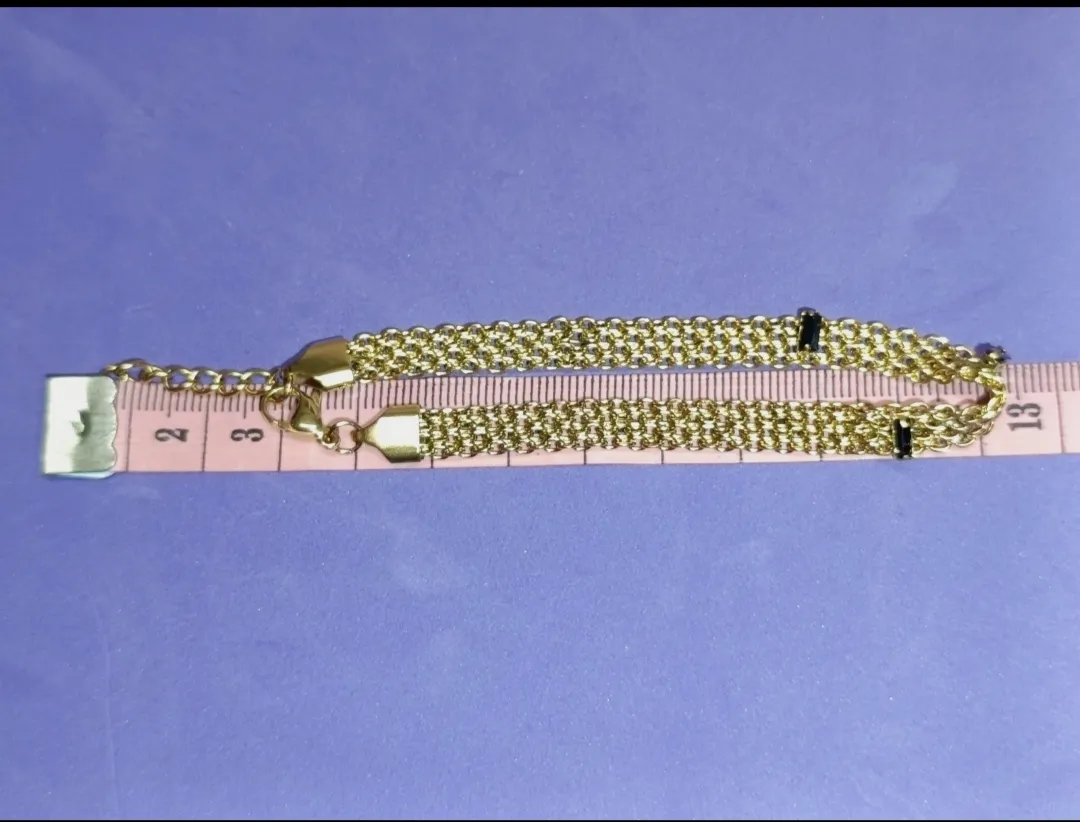 Conjunto acero dorado y piedras oscuras – No brand – taille Taille unique 6
