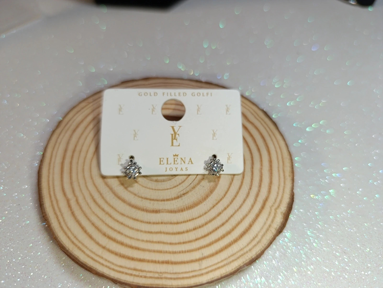 Aretes oro blanco laminado con circonitas de Elena Joyas