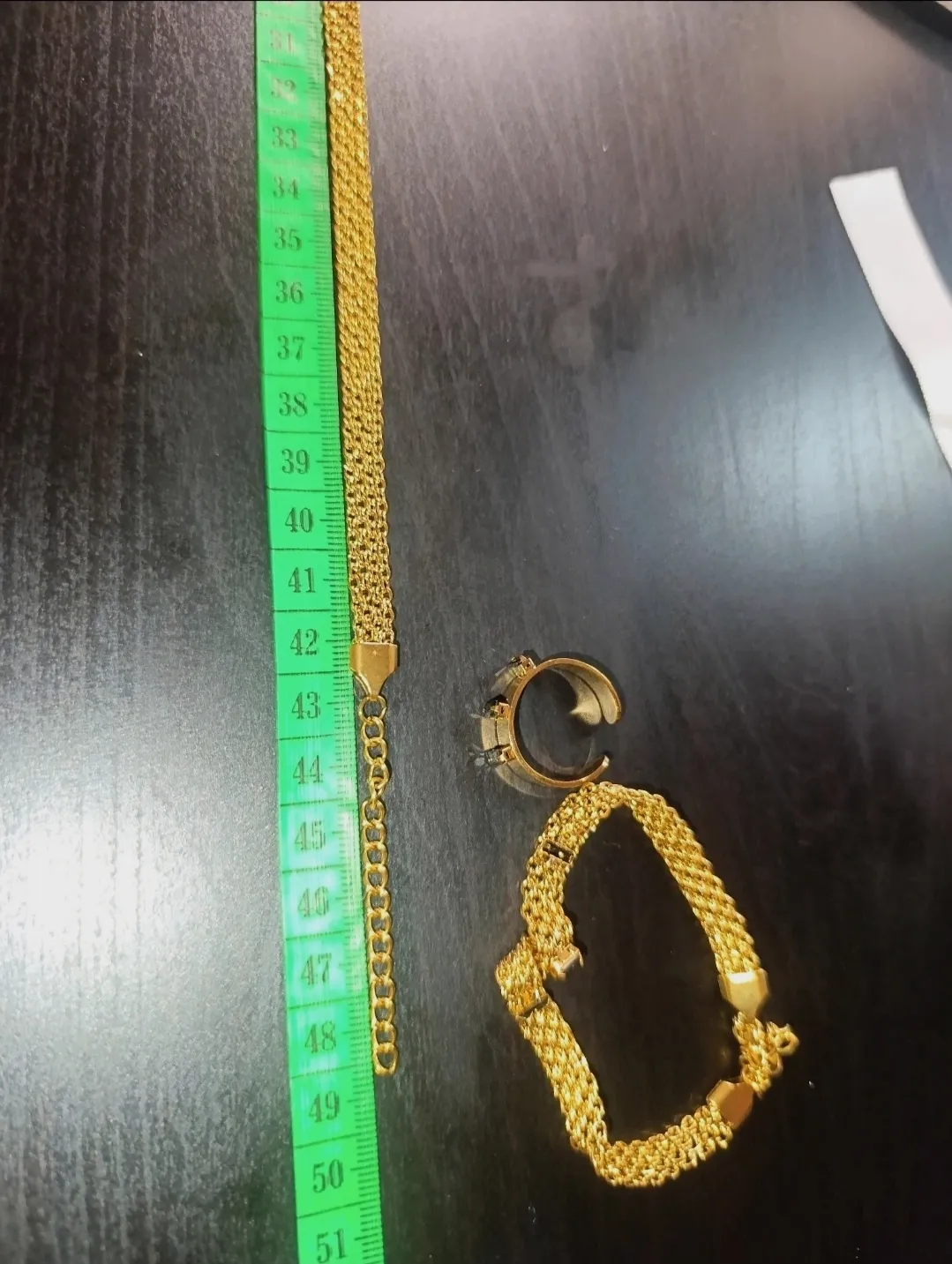 Conjunto acero dorado y piedras oscuras – No brand – taille Taille unique 7