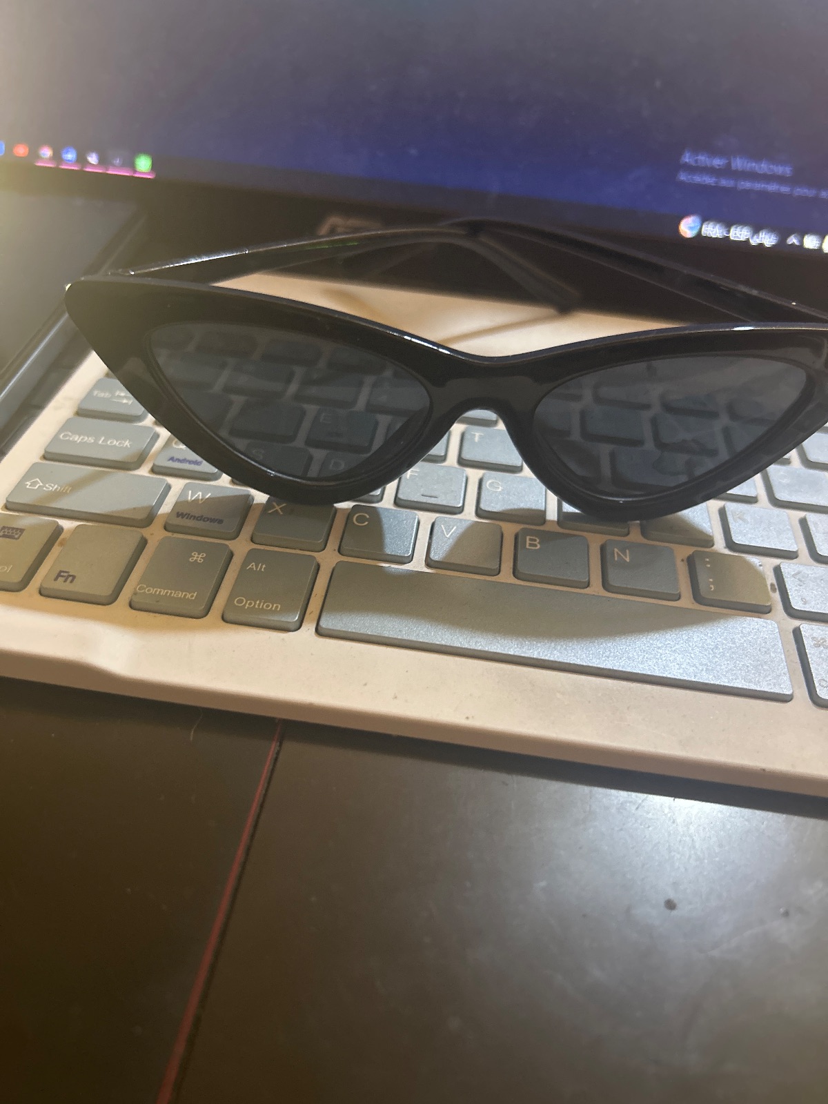 Lunettes de soleil cat-eye noires
