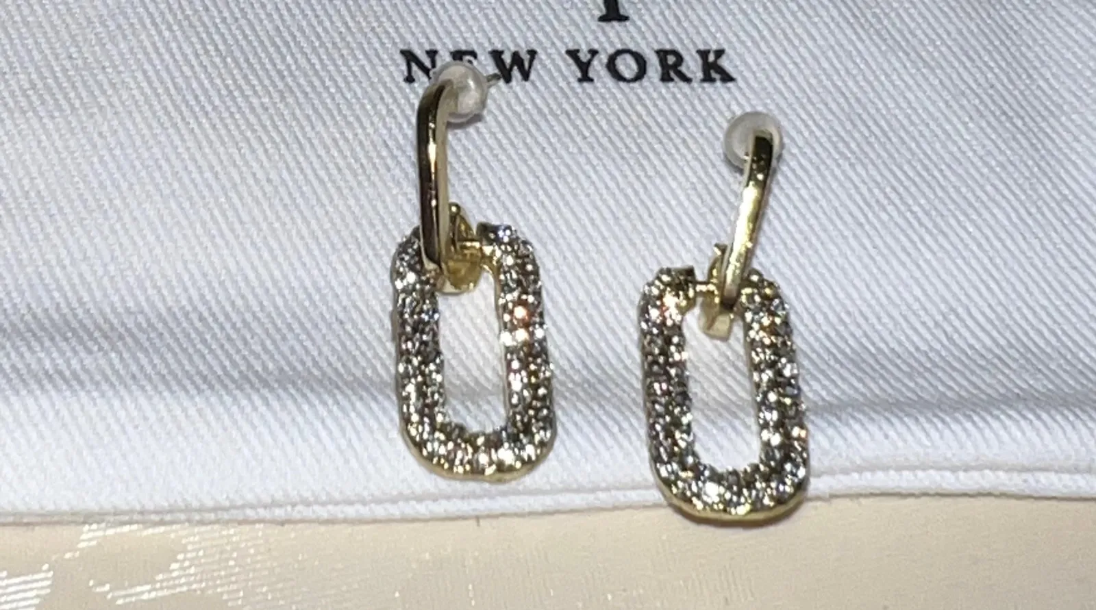 Boucles d'oreilles chaînettes strass doré