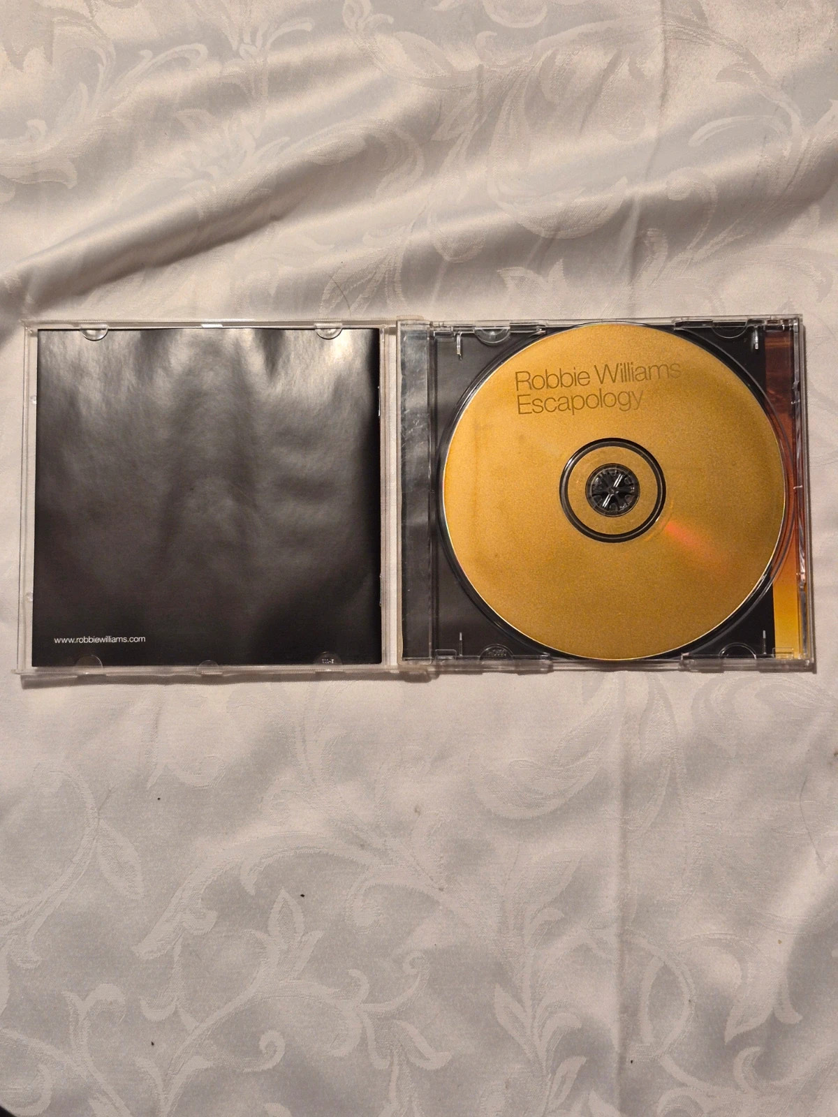 CD Robbie Williams - Album "Escapology" 4