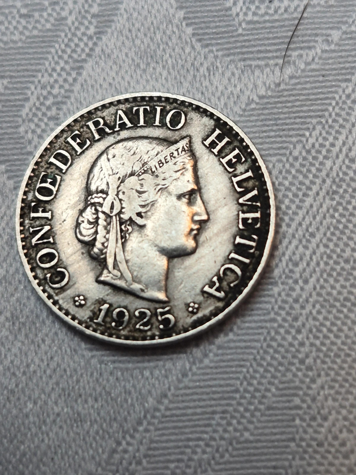 Pièce de 10 Rappen suisse (1925) 4