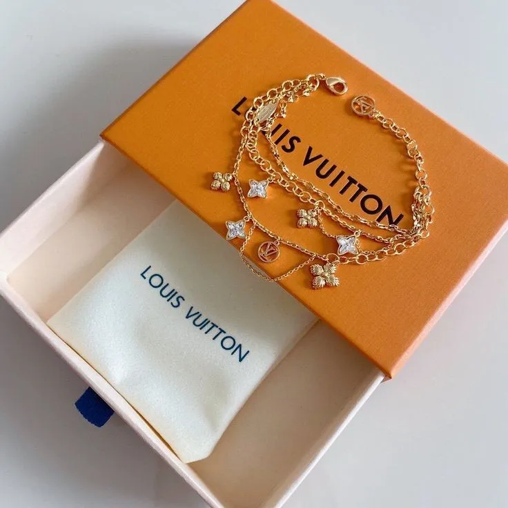 Bracelet Louis Vuitton chaîne dorée strass