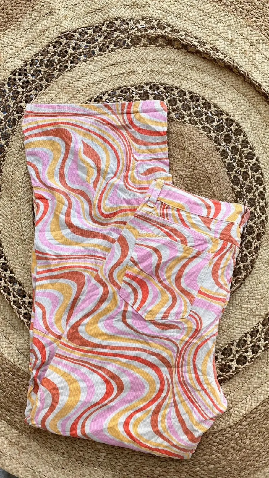 Leggings motif ondulé rose et orange
