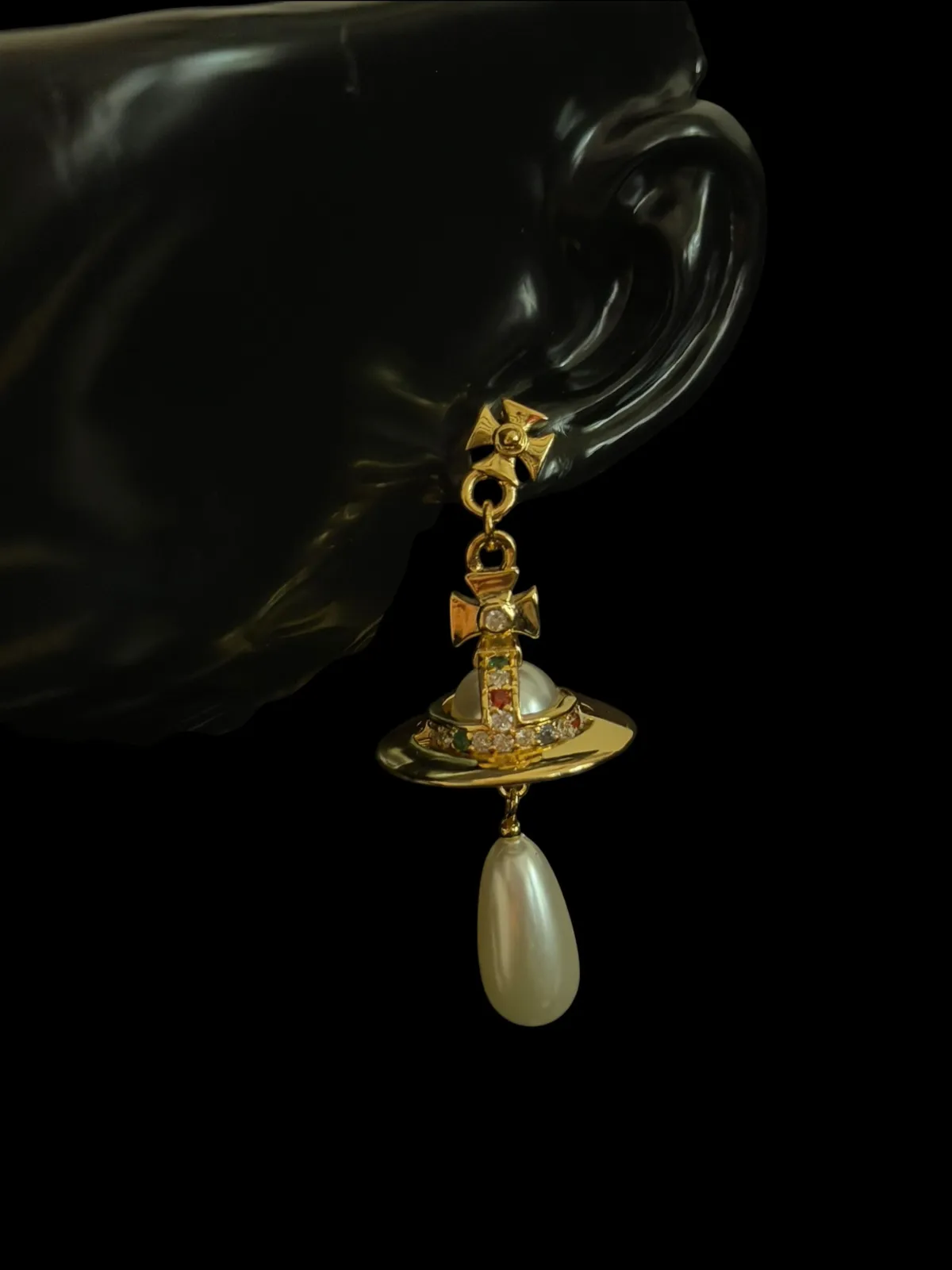 Boucles d'oreilles dorées pendantes perle