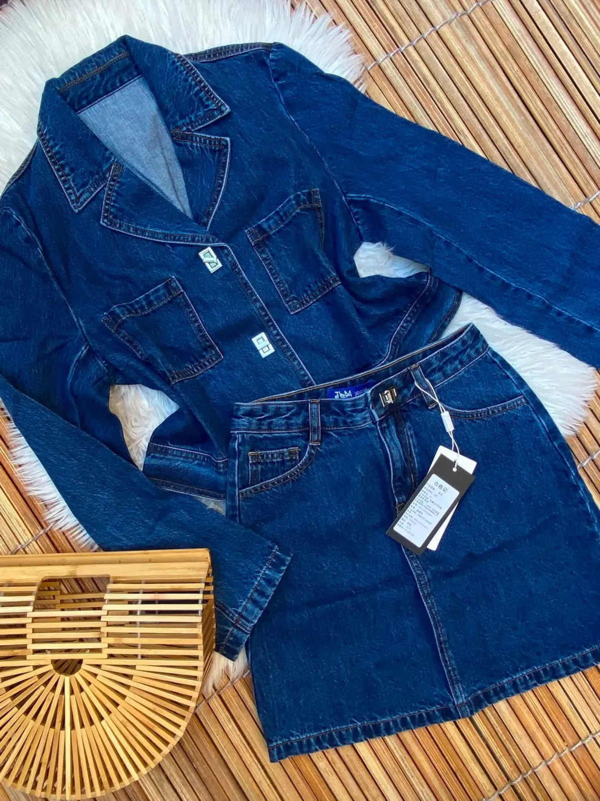 Veste en jean bleu brut avec ceinture