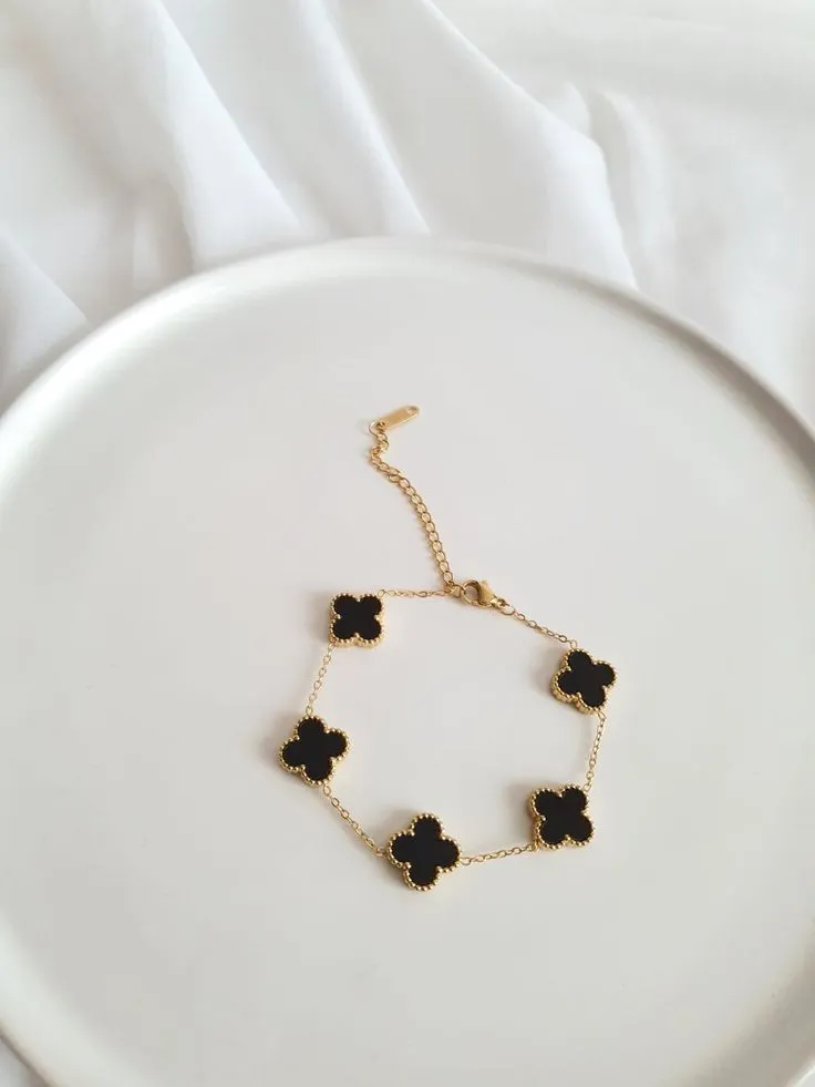 Bracelet chaîne trèfles noirs dorés