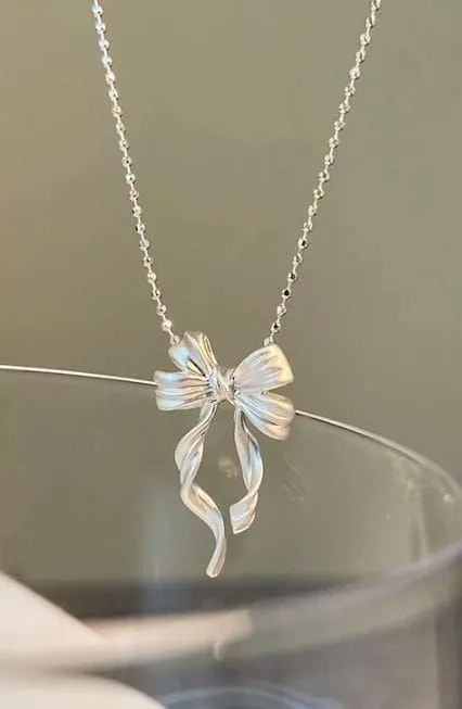 Collier nœud strass doré 2