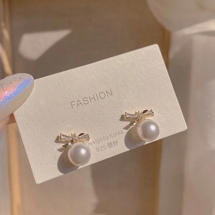 Boucles d'oreilles perles nœud doré