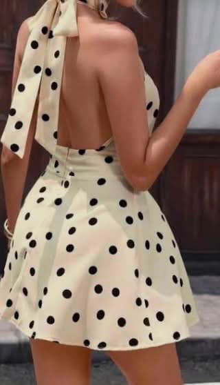 Robe à pois crème et noir dos nu