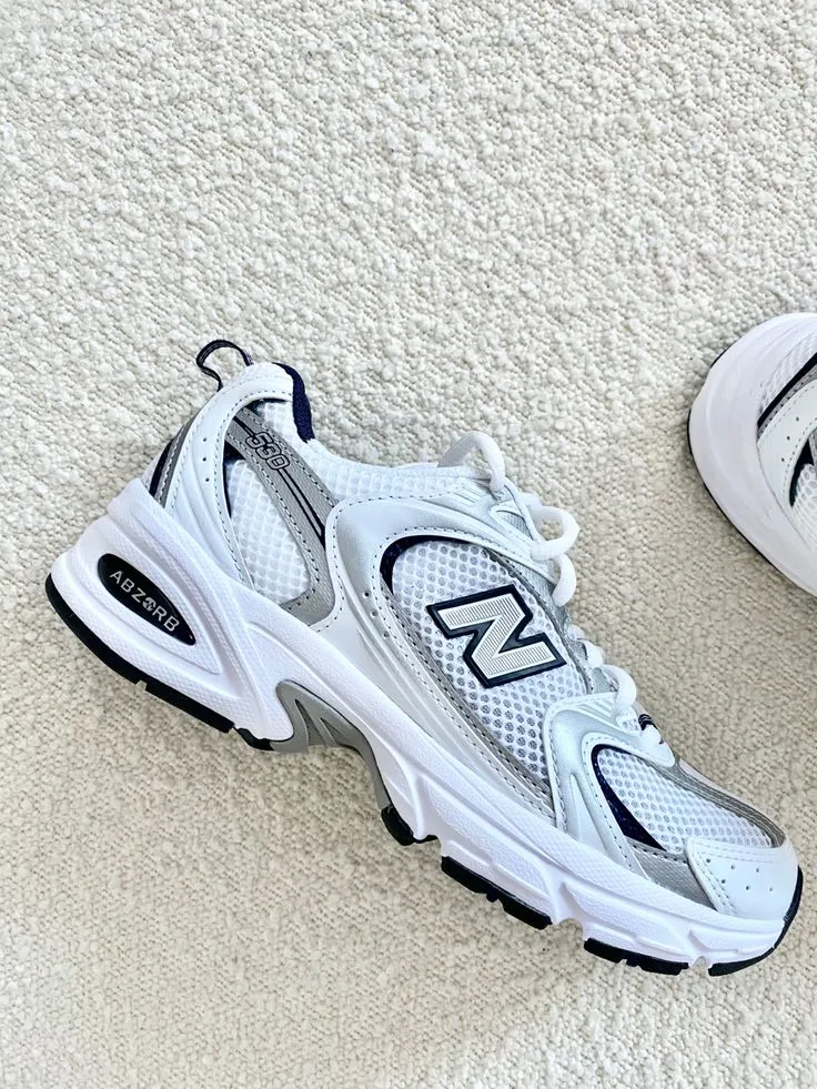 Baskets New Balance blanches noires 3
