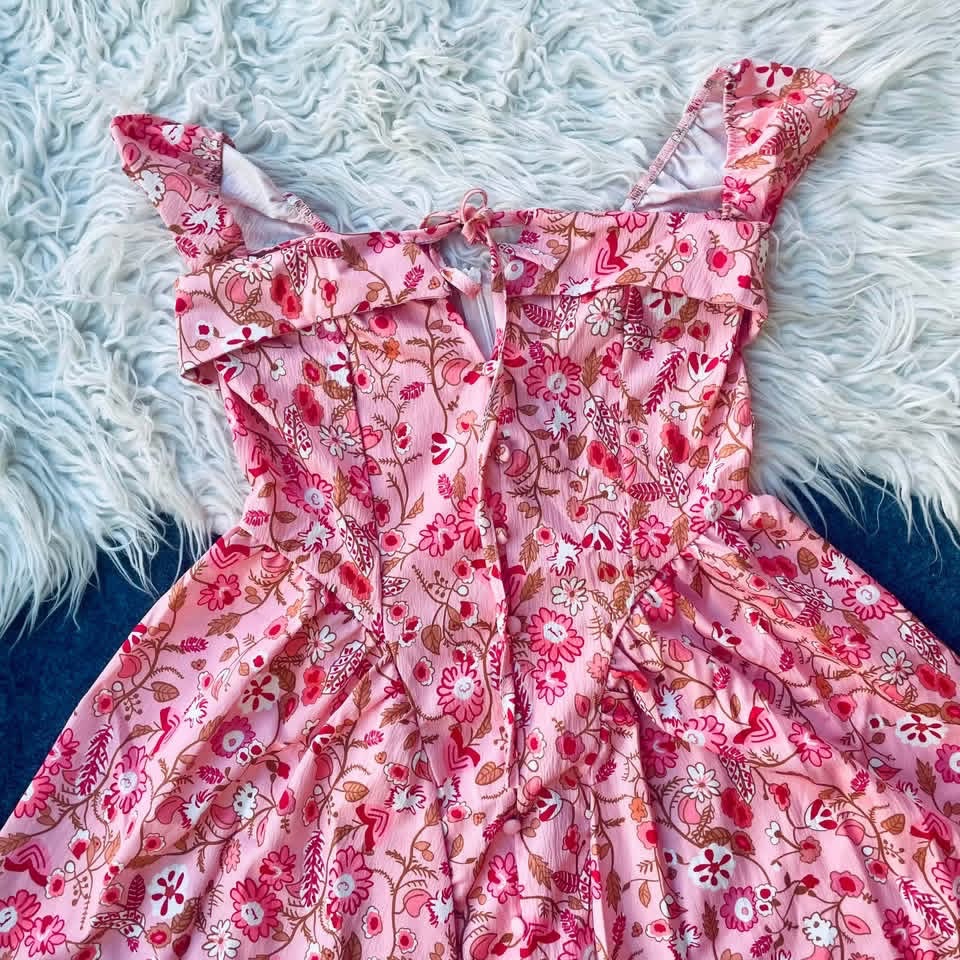 Robe fillette rose à fleurs volantées