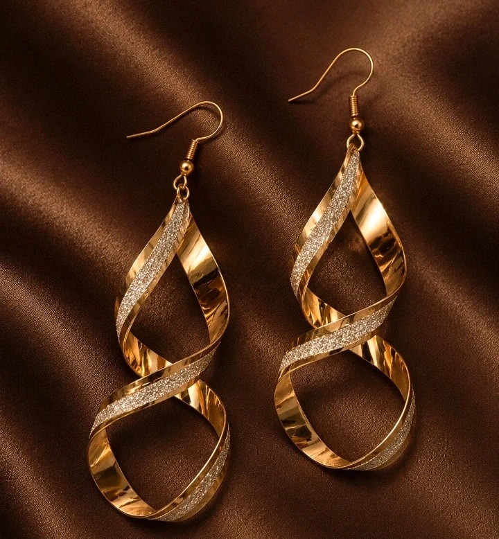 Boucles d'oreilles dorées torsadée – Dorè 2