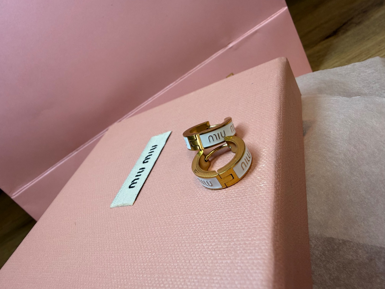 Boucles d'oreilles Miu Miu dorées email 7