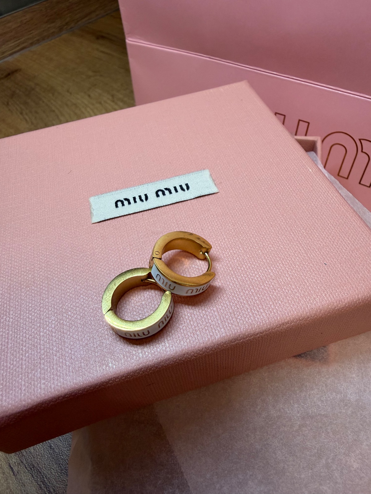 Boucles d'oreilles Miu Miu dorées email 6