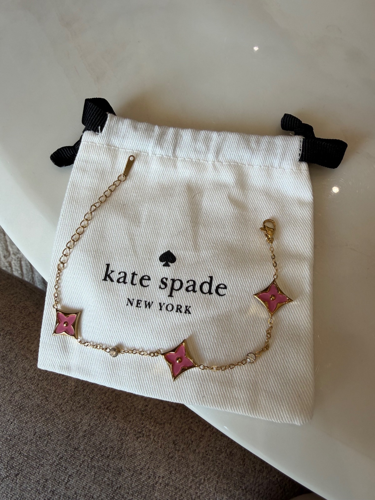 Bracelet kate spade NEW YORK étoiles roses