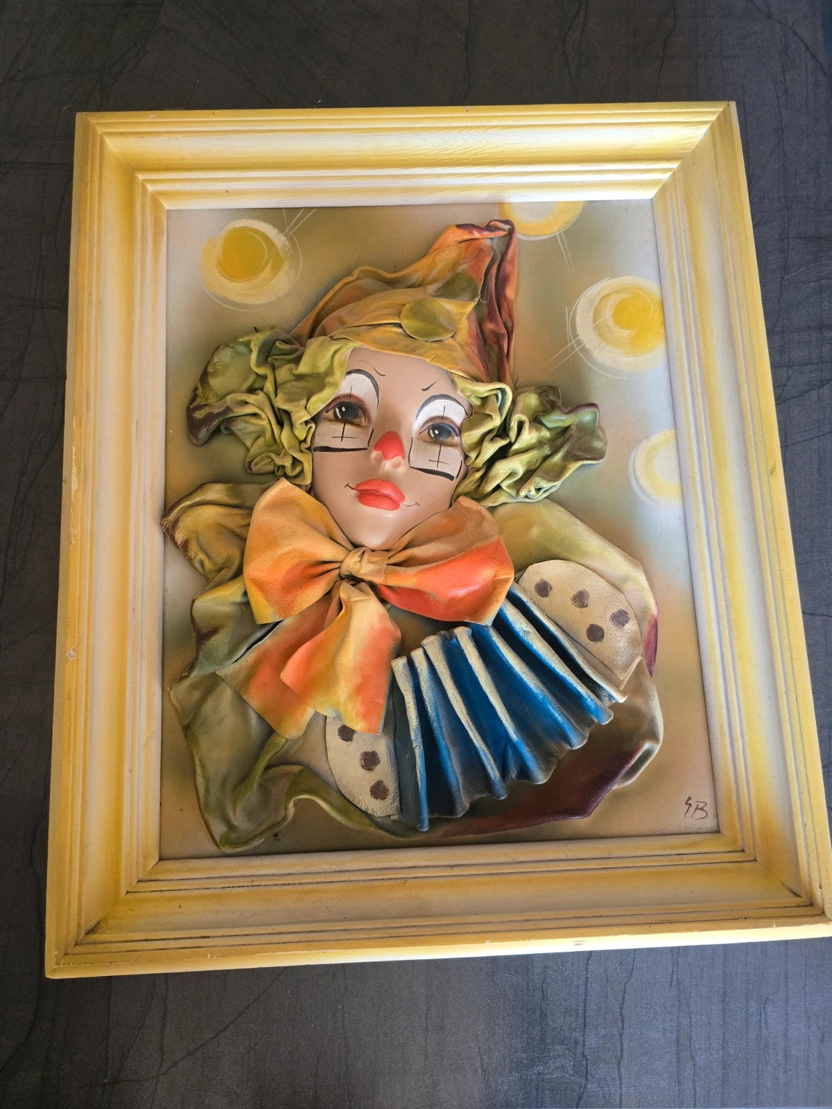 Tableau tete clown en cuir