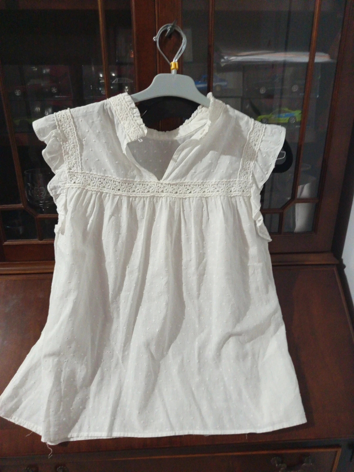 Blouse blanche sans manches plumetis Kiabi M