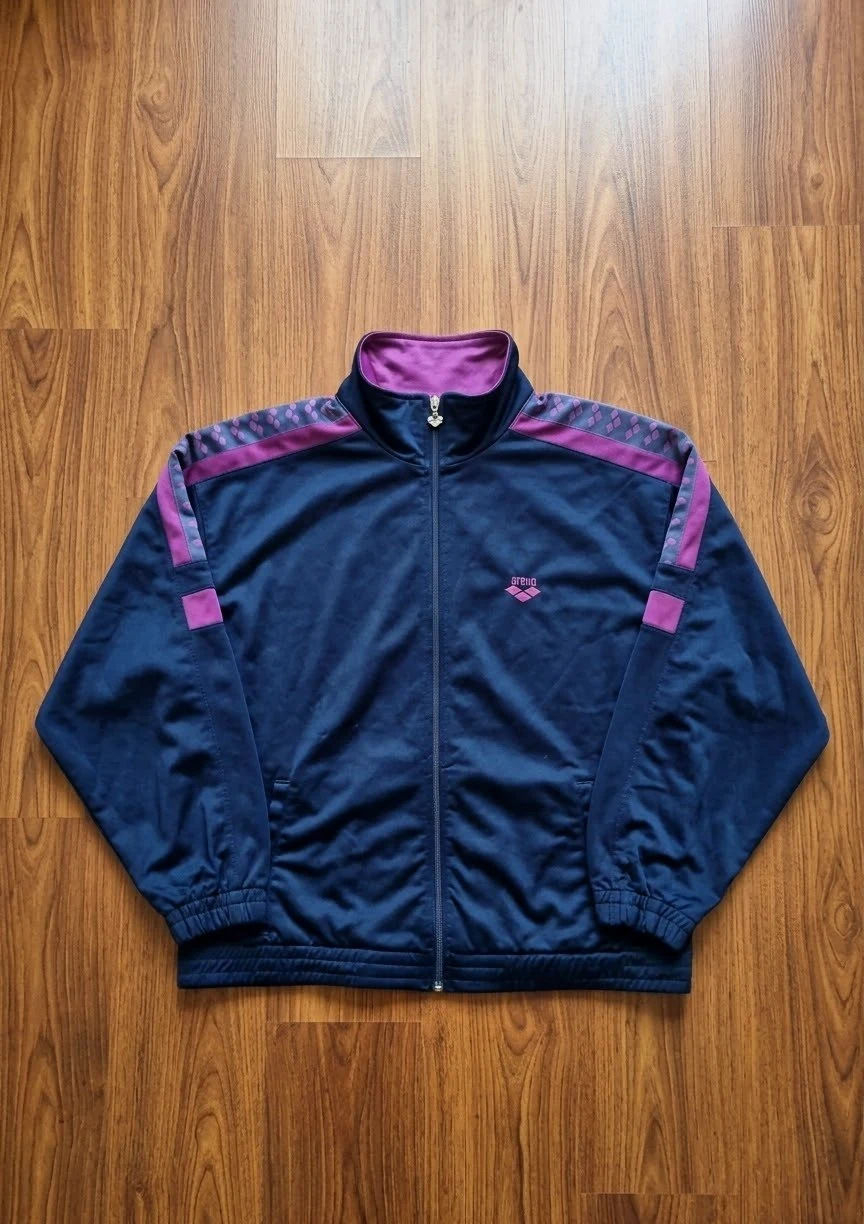 Chaqueta deportiva vintage de la marca Arena.