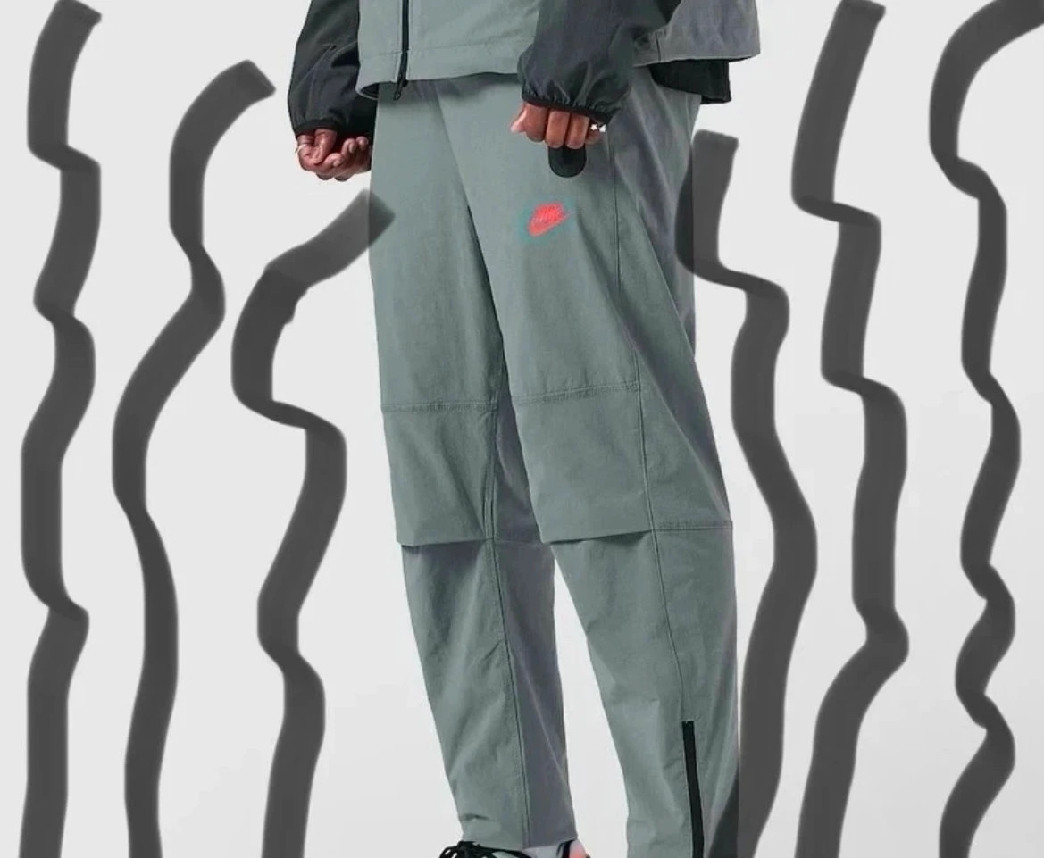 Jogging Nike coupe fuselée taille XS couleur gris