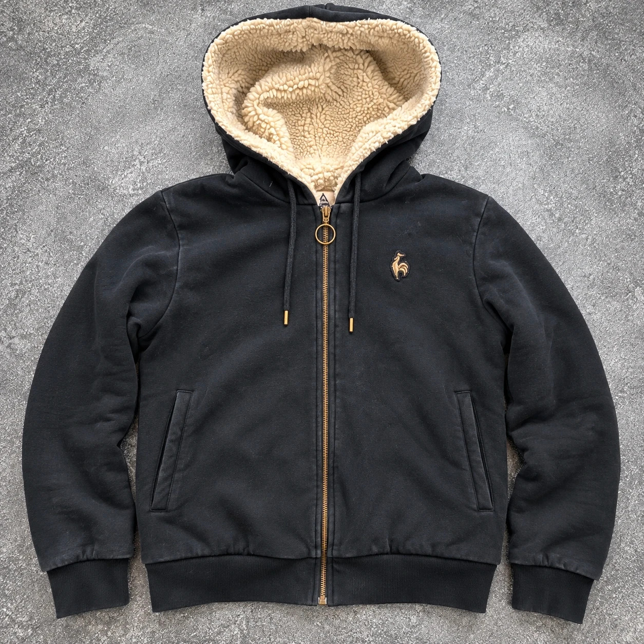 Le Coq Sportif sweat zippé à capuche sherpa noir M/S – Doublure moutonnée – Sportswear rétro