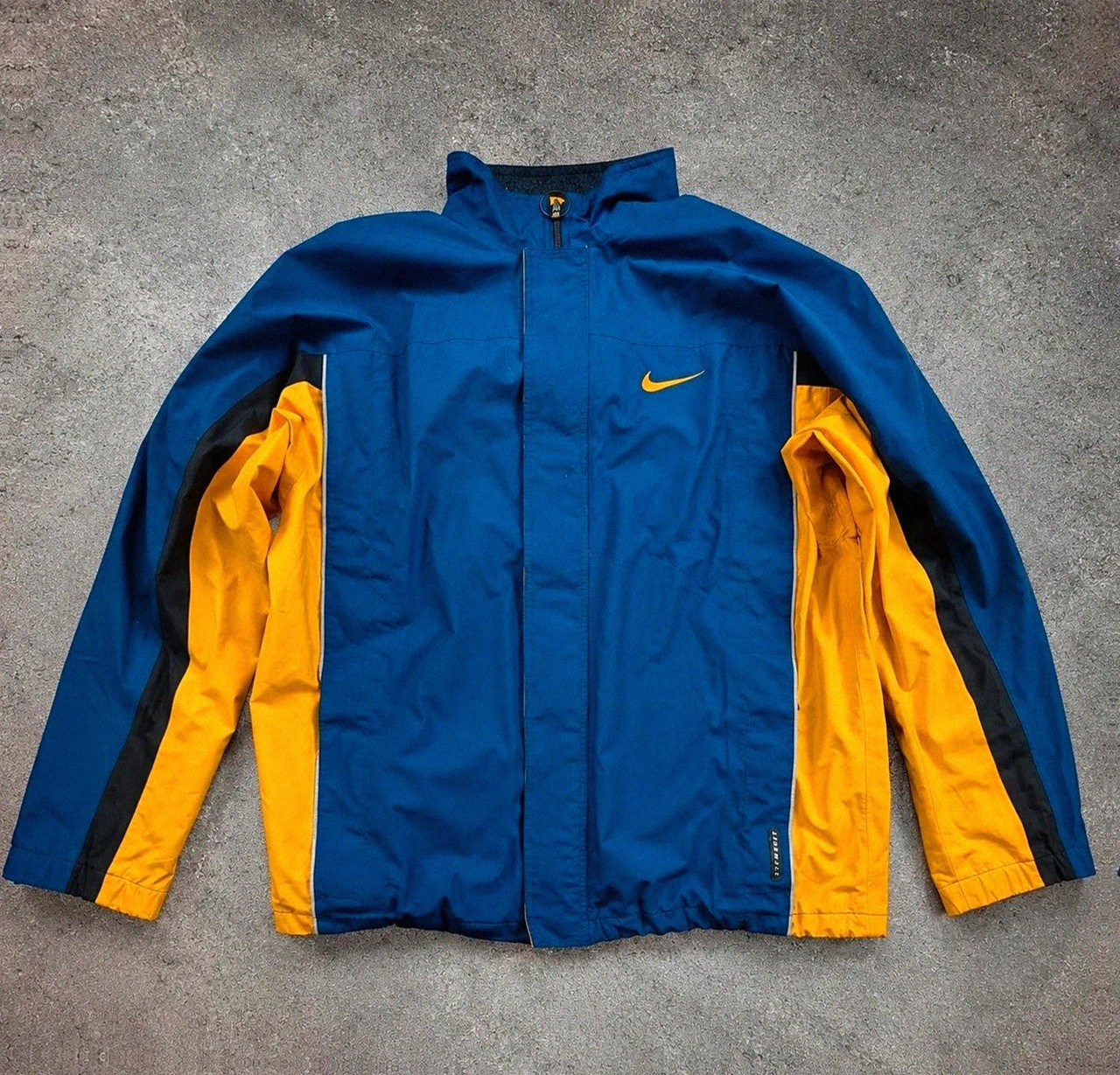 Veste Nike storm-fit vintage bleu jaune coupe vent outdoor gorpcore Y2K XL/2XL