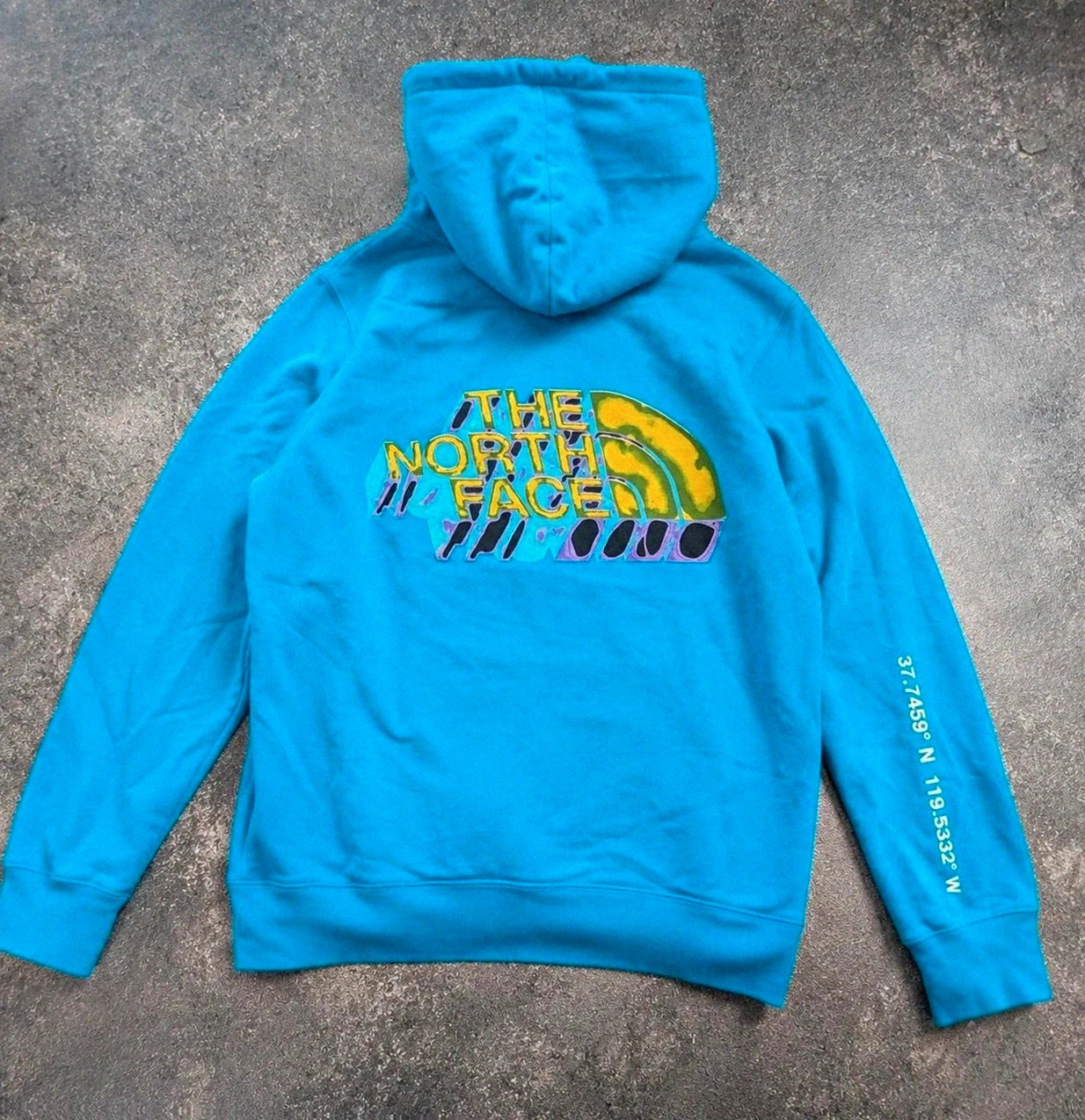 Hoodie graphique The North Face bleu turquoise coordonnées outdoor M