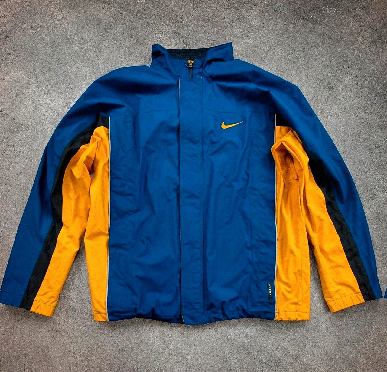 Veste Nike storm-fit vintage bleu jaune coupe vent outdoor gorpcore Y2K XL/2XL